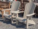 Two Woodgrain Poly Adirondack Chairs
